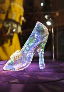The “Glass” Slipper designed for the film made by Swarovski, also included a golden butterfly studded with smaller crystals.  